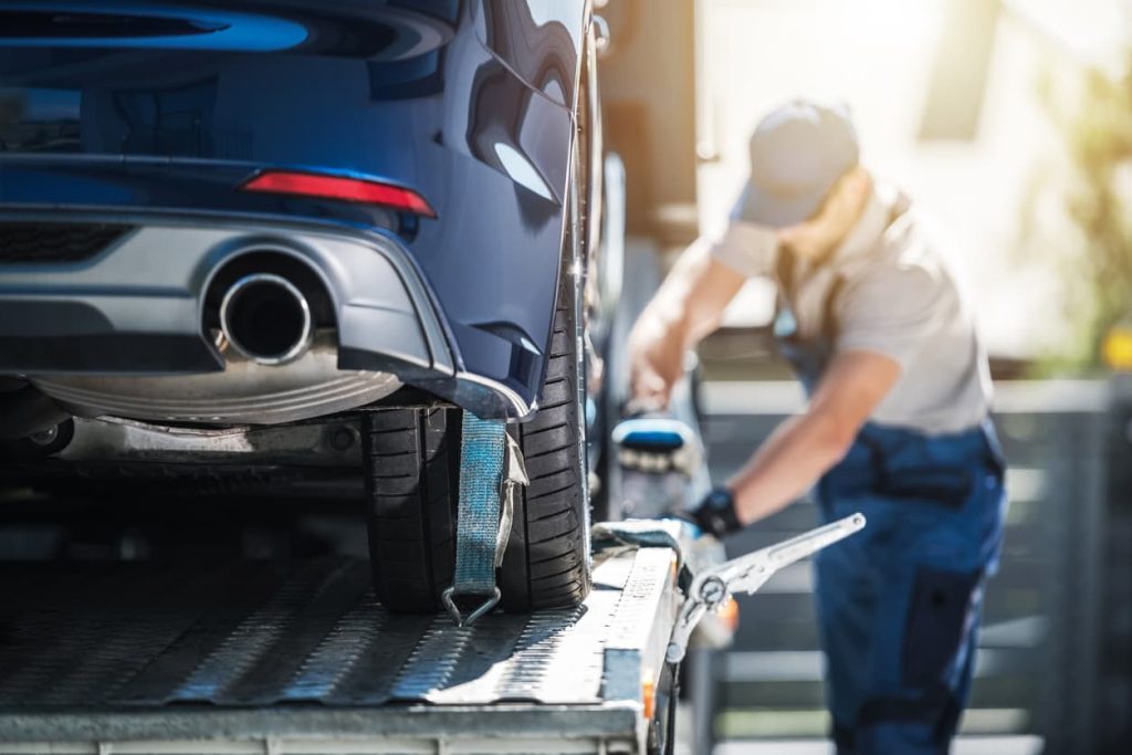 a shipping vendor moving a vehicle from a dealership with inventory, despite the car chips shortage.