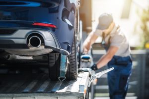 a shipping vendor moving a vehicle from a dealership with inventory, despite the car chips shortage.